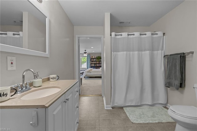 1216 New Born Ct, Chesapeake, VA 23322 - ensuite bathroom featuring vanity, tile patterned floors, a ceiling fan, and a shower with shower curtain