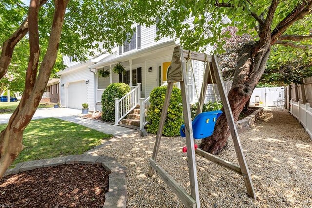 1216 New Born Ct, Chesapeake, VA 23322 - view of front of home featuring an attached garage and covered porch