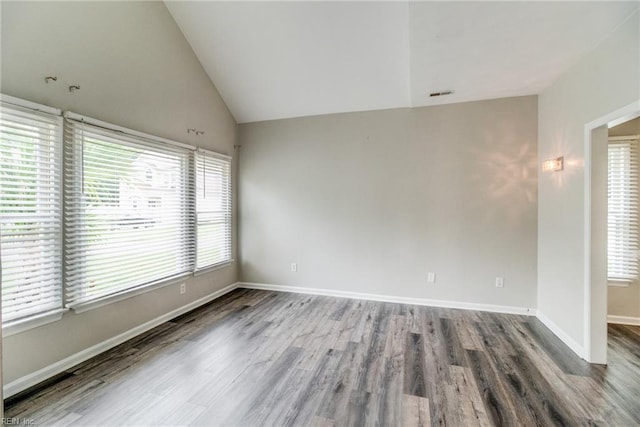 32 Gunter Ct, Hampton, VA 23666 - empty room featuring wood finished floors, lofted ceiling, and baseboards