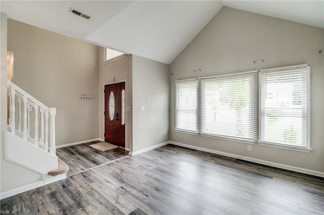 32 Gunter Ct, Hampton, VA 23666 - entrance foyer featuring plenty of natural light, stairway, high vaulted ceiling, wood finished floors, and baseboards