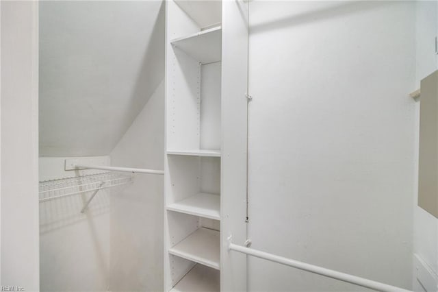 32 Gunter Ct, Hampton, VA 23666 - walk in closet featuring vaulted ceiling