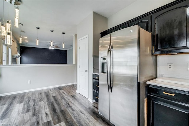 32 Gunter Ct, Hampton, VA 23666 - kitchen featuring stainless steel fridge, wood finished floors, dark cabinetry, and light countertops