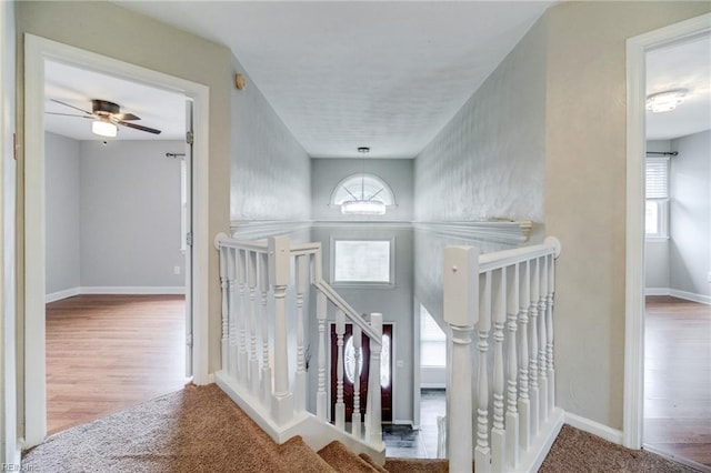 32 Gunter Ct, Hampton, VA 23666 - stairway featuring baseboards, wood finished floors, and ceiling fan
