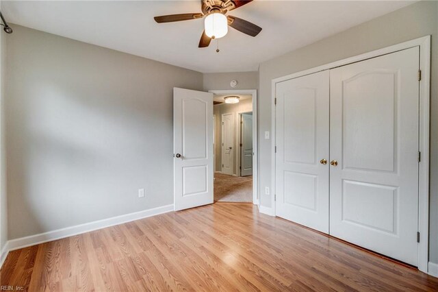 32 Gunter Ct, Hampton, VA 23666 - unfurnished bedroom with a closet, light wood-style floors, baseboards, and ceiling fan