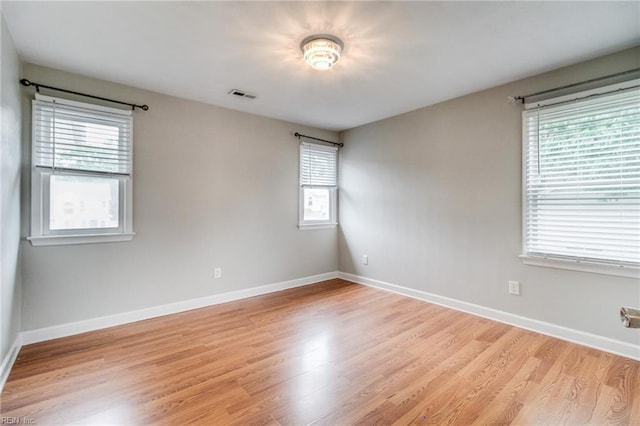32 Gunter Ct, Hampton, VA 23666 - empty room featuring plenty of natural light, light wood-type flooring, and baseboards