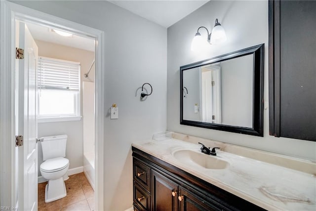32 Gunter Ct, Hampton, VA 23666 - bathroom with vanity, toilet, washtub / shower combination, tile patterned flooring, and baseboards