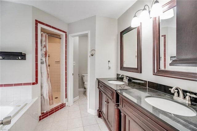 32 Gunter Ct, Hampton, VA 23666 - bathroom featuring a shower stall, toilet, vanity, tile patterned flooring, and tiled tub