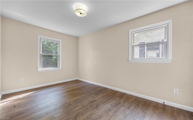 1535 Vine St, Norfolk, VA 23523 - unfurnished room with baseboards and wood finished floors