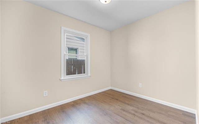1535 Vine St, Norfolk, VA 23523 - empty room featuring baseboards and wood finished floors