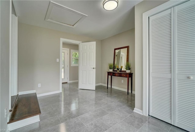 116 Odd Rd, Poquoson, VA 23662 - corridor with baseboards and attic access