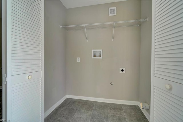 116 Odd Rd, Poquoson, VA 23662 - washroom with hookup for an electric dryer, washer hookup, baseboards, dark tile patterned floors, and hookup for a gas dryer