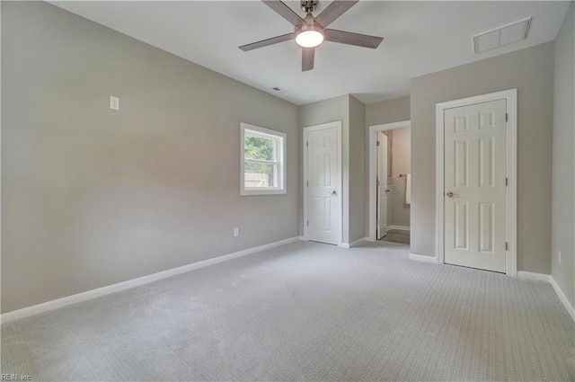 116 Odd Rd, Poquoson, VA 23662 - unfurnished bedroom with light carpet, baseboards, and a ceiling fan