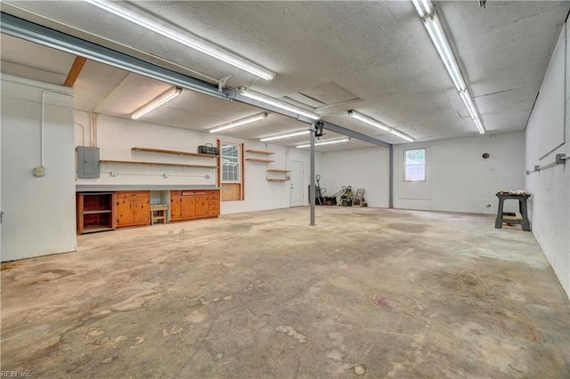 116 Odd Rd, Poquoson, VA 23662 - garage with electric panel and a garage door opener