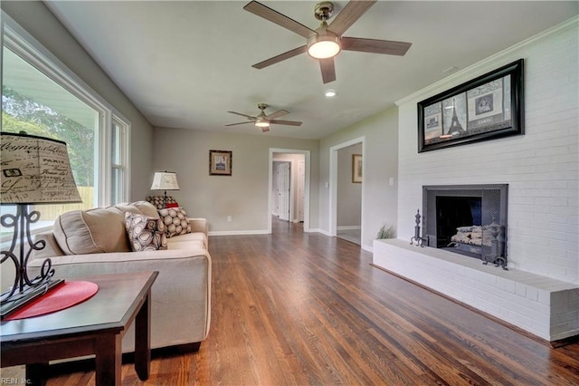 116 Odd Rd, Poquoson, VA 23662 - living area with ceiling fan, baseboards, wood finished floors, a brick fireplace, and recessed lighting