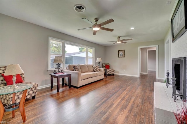 116 Odd Rd, Poquoson, VA 23662 - living area with a ceiling fan, wood finished floors, baseboards, a fireplace, and recessed lighting