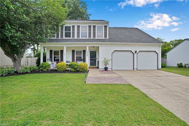 1240 Mozart Dr, Virginia Beach, VA 23454 - view of front of property featuring an attached garage, driveway, a porch, and a front lawn