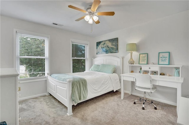 1240 Mozart Dr, Virginia Beach, VA 23454 - bedroom featuring carpet floors, multiple windows, baseboards, and a ceiling fan