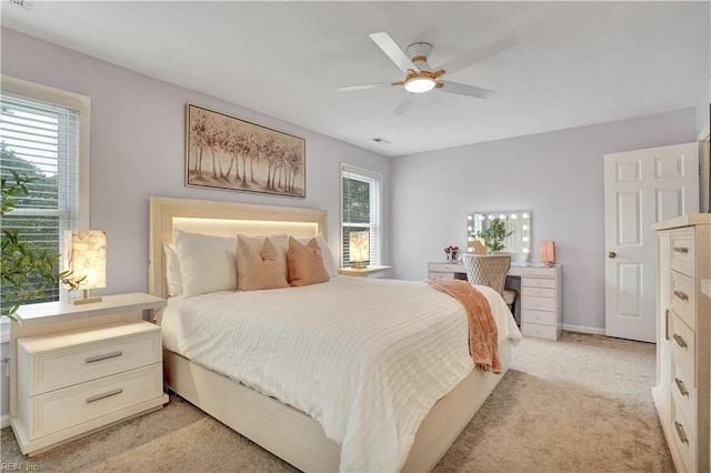 1240 Mozart Dr, Virginia Beach, VA 23454 - bedroom with light carpet, baseboards, and a ceiling fan
