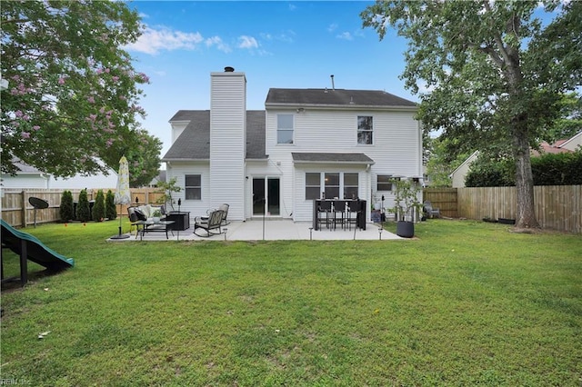 1240 Mozart Dr, Virginia Beach, VA 23454 - rear view of house featuring a patio area and a chimney
