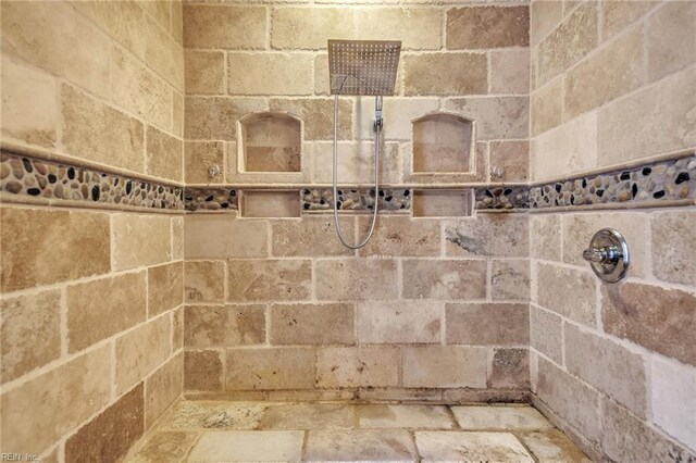 111 W Tazewell St Unit 200, Norfolk, VA 23510 - full bathroom featuring a tile shower and stone finish floors