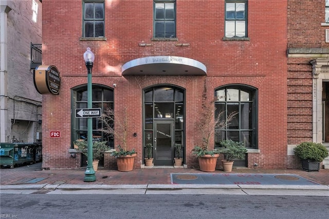 111 W Tazewell St Unit 200, Norfolk, VA 23510 - view of exterior entry with brick siding