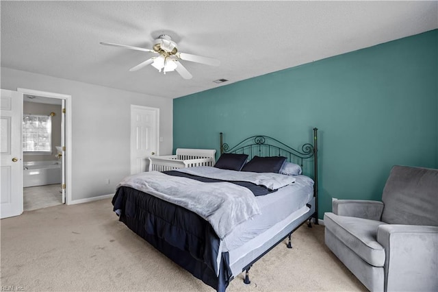 1244 Bell Tower Arch, Chesapeake, VA 23324 - bedroom with light carpet, a ceiling fan, baseboards, connected bathroom, and a textured ceiling