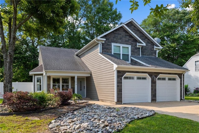 2389 Kerr Dr, Virginia Beach, VA 23454 - view of front of house with concrete driveway, stone siding, and roof with shingles