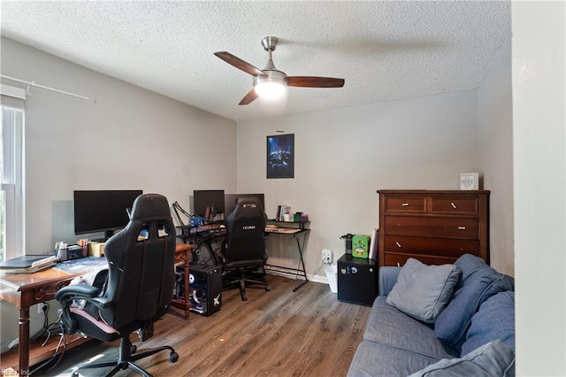 2389 Kerr Dr, Virginia Beach, VA 23454 - home office with wood finished floors, a ceiling fan, and a textured ceiling