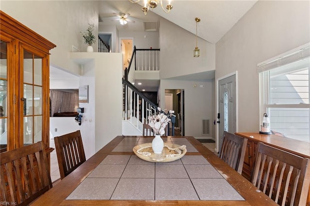 2389 Kerr Dr, Virginia Beach, VA 23454 - dining room featuring high vaulted ceiling, stairs, and a ceiling fan