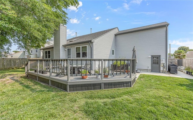 1213 Mozart Dr, Virginia Beach, VA 23454 - rear view of property with a wooden deck, a chimney, and a patio area
