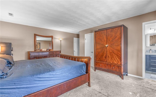 1213 Mozart Dr, Virginia Beach, VA 23454 - bedroom featuring carpet, ensuite bath, and baseboards