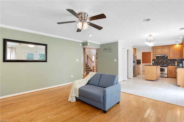 6 Elite Ct, Hampton, VA 23666 - living area featuring light wood-type flooring, crown molding, baseboards, stairs, and ceiling fan