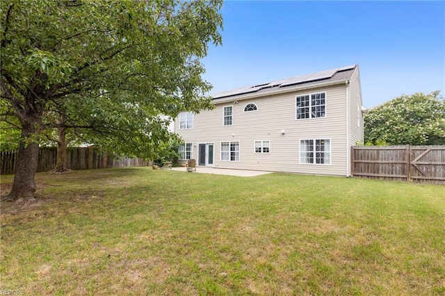 6 Elite Ct, Hampton, VA 23666 - rear view of property with roof mounted solar panels and a patio area