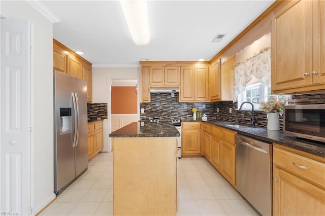 6 Elite Ct, Hampton, VA 23666 - kitchen featuring appliances with stainless steel finishes, a center island, under cabinet range hood, decorative backsplash, and a sink