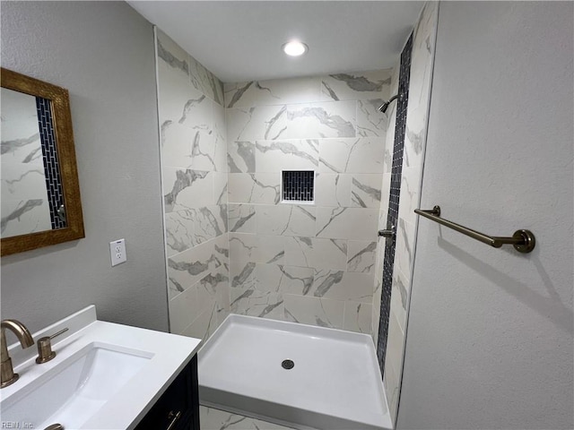 420 Webb St, Suffolk, VA 23434 - full bathroom featuring vanity, a shower stall, and marble look tiles