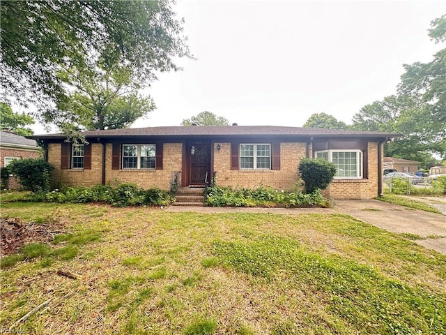 1649 Cardigan St, Chesapeake, VA 23324 - single story home with brick siding and a front yard