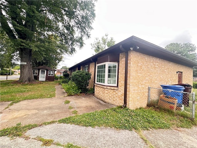 1649 Cardigan St, Chesapeake, VA 23324 - view of side of home featuring brick siding