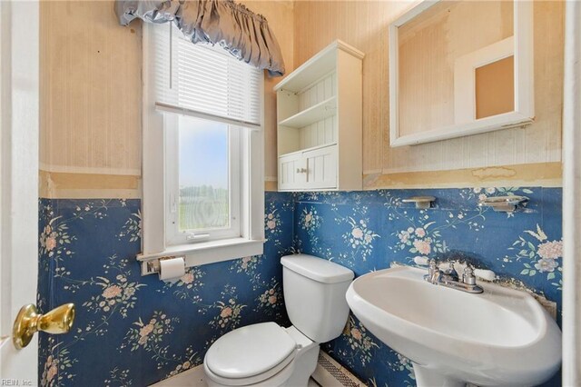 2718 Chesterfield Blvd, Norfolk, VA 23504 - bathroom with wallpapered walls, toilet, and a sink