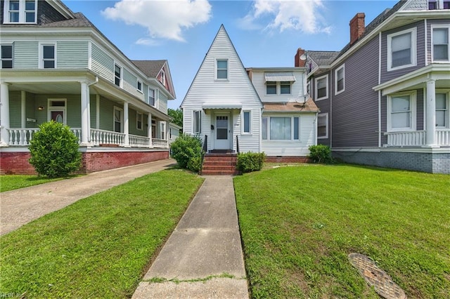 2718 Chesterfield Blvd, Norfolk, VA 23504 - view of front of house with a front lawn and covered porch