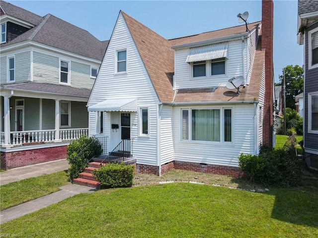 2718 Chesterfield Blvd, Norfolk, VA 23504 - view of front of property with a front yard, roof with shingles, a chimney, and covered porch