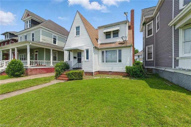 2718 Chesterfield Blvd, Norfolk, VA 23504 - view of front of property with a front lawn, a shingled roof, and covered porch