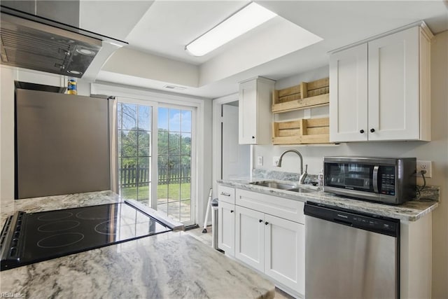 1305 Ettington Ln, Virginia Beach, VA 23464 - kitchen with appliances with stainless steel finishes, a sink, light stone countertops, and white cabinetry