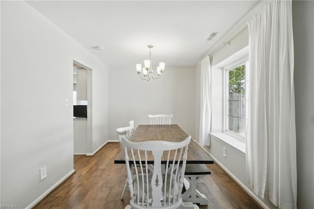 1305 Ettington Ln, Virginia Beach, VA 23464 - dining space featuring a chandelier, hardwood / wood-style floors, and baseboards