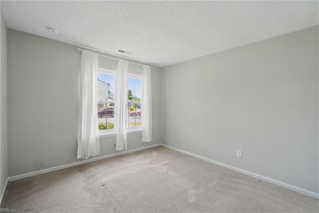 1305 Ettington Ln, Virginia Beach, VA 23464 - carpeted empty room featuring a textured ceiling, baseboards, and a smoke detector