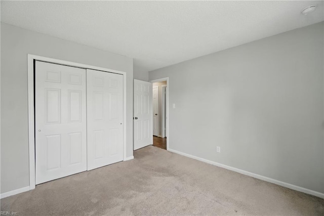 1305 Ettington Ln, Virginia Beach, VA 23464 - unfurnished bedroom featuring carpet floors, baseboards, and a closet