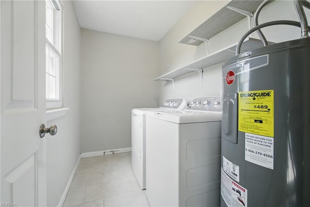 1305 Ettington Ln, Virginia Beach, VA 23464 - washroom featuring water heater, baseboards, washer and clothes dryer, and light tile patterned floors