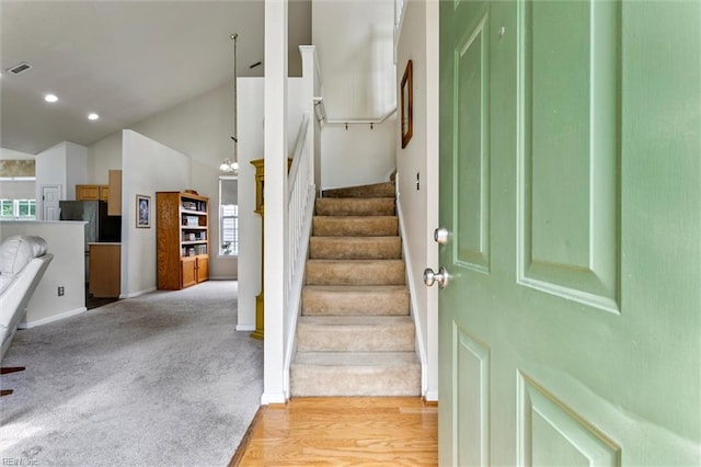 113 Trevor Trce, Yorktown, VA 23692 - stairway featuring plenty of natural light, lofted ceiling, carpet flooring, and recessed lighting