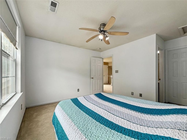113 Trevor Trce, Yorktown, VA 23692 - bedroom featuring carpet flooring, a ceiling fan, and a textured ceiling