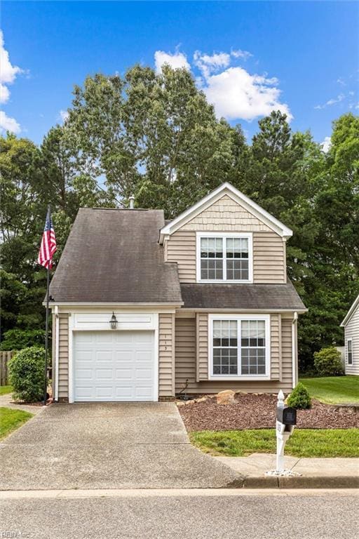 113 Trevor Trce, Yorktown, VA 23692 - view of front of house with concrete driveway and a garage