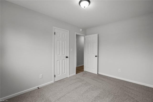 13 Cortez Ct, Hampton, VA 23666 - empty room featuring carpet floors and baseboards